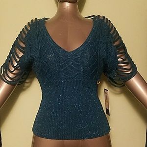 Go to Mercari  Rocawear sparkly sweater NWT